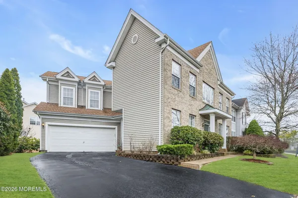 $869,000 | 155 Point Of Woods Boulevard, Morganville, NJ 07751