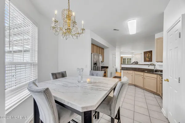$869,000 | 155 Point Of Woods Boulevard, Morganville, NJ 07751