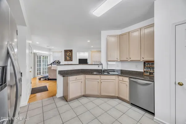 $869,000 | 155 Point Of Woods Boulevard, Morganville, NJ 07751