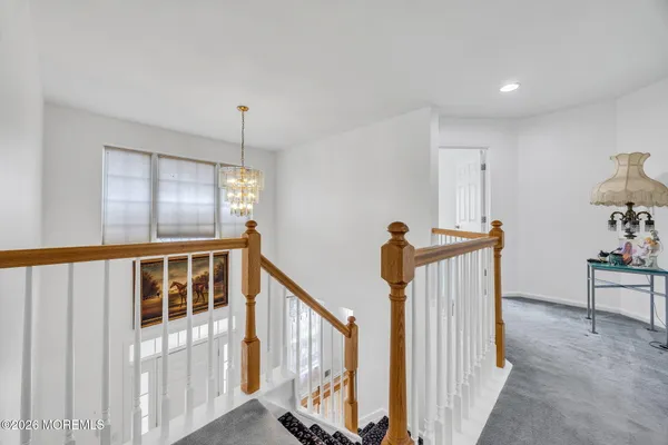 $869,000 | 155 Point Of Woods Boulevard, Morganville, NJ 07751