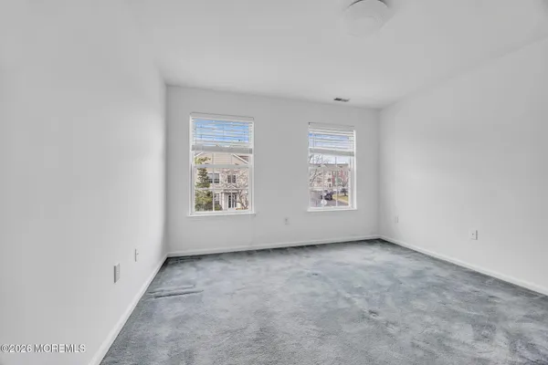 $869,000 | 155 Point Of Woods Boulevard, Morganville, NJ 07751