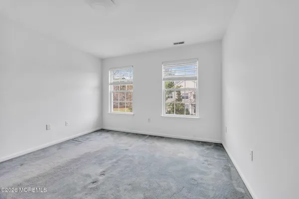 $869,000 | 155 Point Of Woods Boulevard, Morganville, NJ 07751