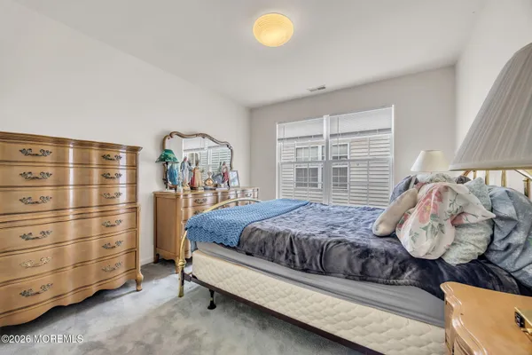 $869,000 | 155 Point Of Woods Boulevard, Morganville, NJ 07751