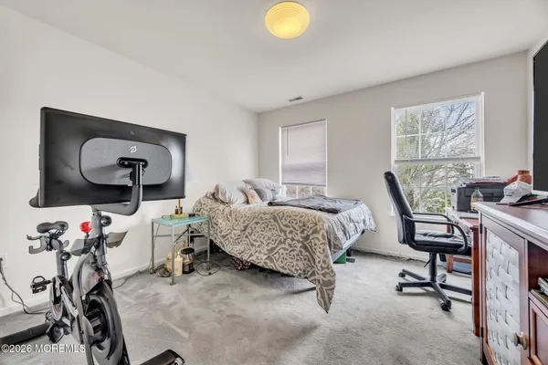 $869,000 | 155 Point Of Woods Boulevard, Morganville, NJ 07751