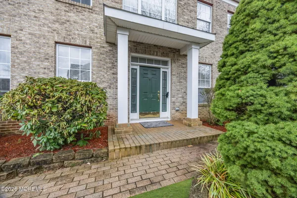 $869,000 | 155 Point Of Woods Boulevard, Morganville, NJ 07751