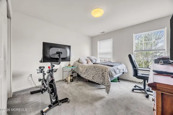 $869,000 | 155 Point Of Woods Boulevard, Morganville, NJ 07751