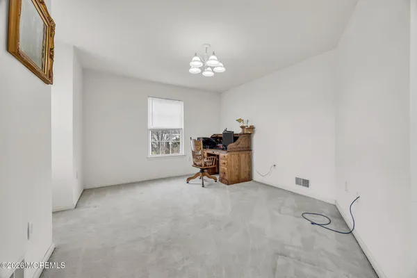 $869,000 | 155 Point Of Woods Boulevard, Morganville, NJ 07751