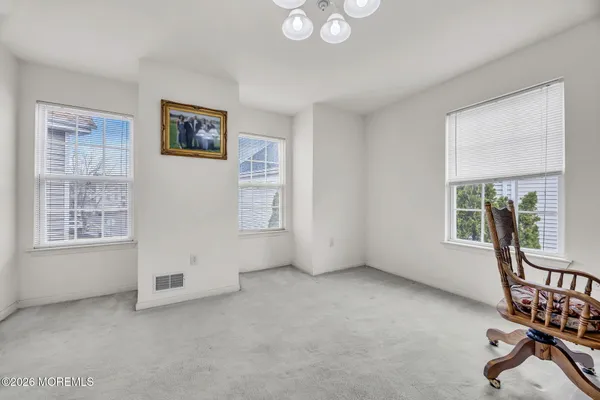 $869,000 | 155 Point Of Woods Boulevard, Morganville, NJ 07751