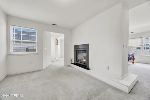 $869,000 | 155 Point Of Woods Boulevard, Morganville, NJ 07751