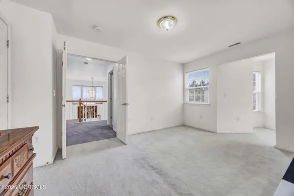 $869,000 | 155 Point Of Woods Boulevard, Morganville, NJ 07751
