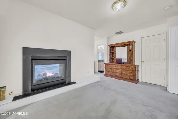 $869,000 | 155 Point Of Woods Boulevard, Morganville, NJ 07751