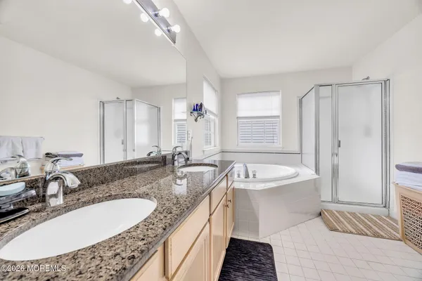 $869,000 | 155 Point Of Woods Boulevard, Morganville, NJ 07751