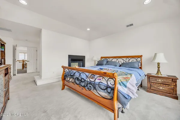 $869,000 | 155 Point Of Woods Boulevard, Morganville, NJ 07751