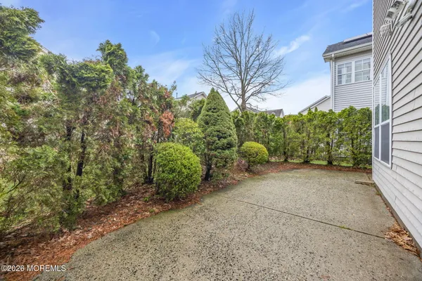 $869,000 | 155 Point Of Woods Boulevard, Morganville, NJ 07751