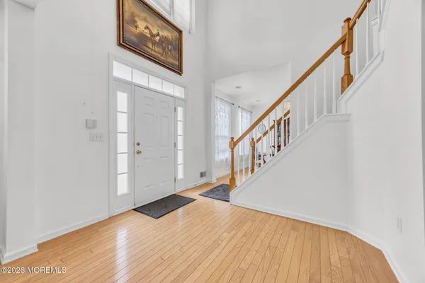 $869,000 | 155 Point Of Woods Boulevard, Morganville, NJ 07751