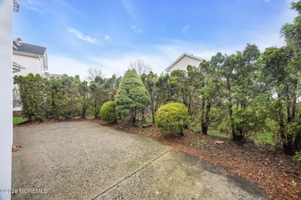 $869,000 | 155 Point Of Woods Boulevard, Morganville, NJ 07751