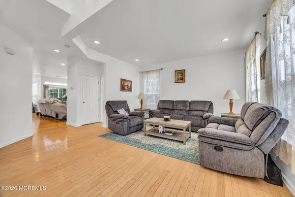 $869,000 | 155 Point Of Woods Boulevard, Morganville, NJ 07751