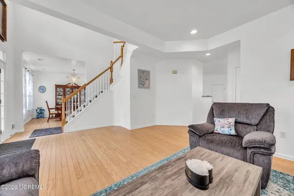 $869,000 | 155 Point Of Woods Boulevard, Morganville, NJ 07751