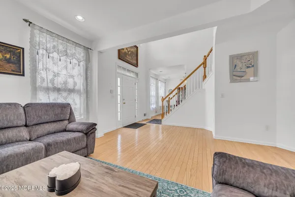 $869,000 | 155 Point Of Woods Boulevard, Morganville, NJ 07751