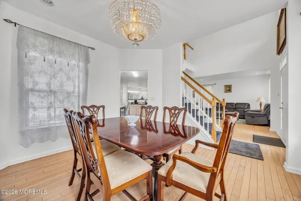 $869,000 | 155 Point Of Woods Boulevard, Morganville, NJ 07751