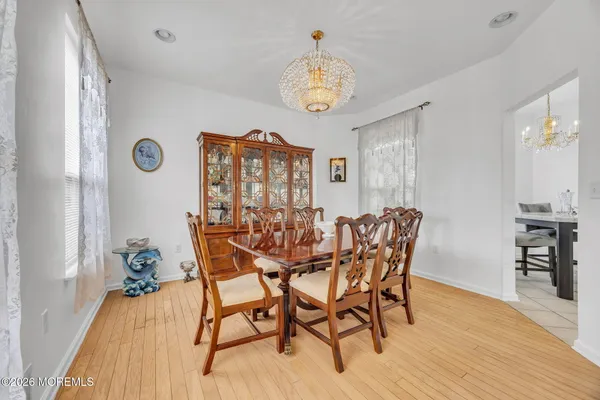 $869,000 | 155 Point Of Woods Boulevard, Morganville, NJ 07751