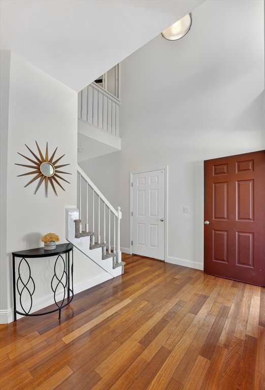 15 Evergreen Circle, Unit 15 Canton, MA 02021 - Photo 4 of 29 a view of entryway with wooden floor