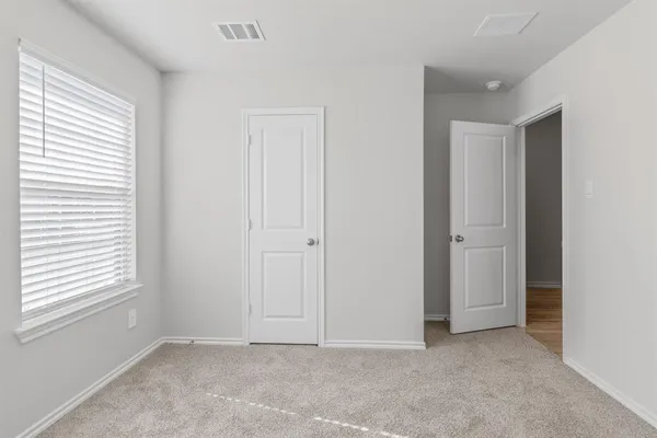 an empty room with a window