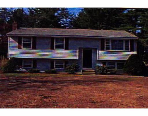 127 Lowell Road Pepperell, MA 01463 - Photo 1 of 1 a view of house with yard and sitting area