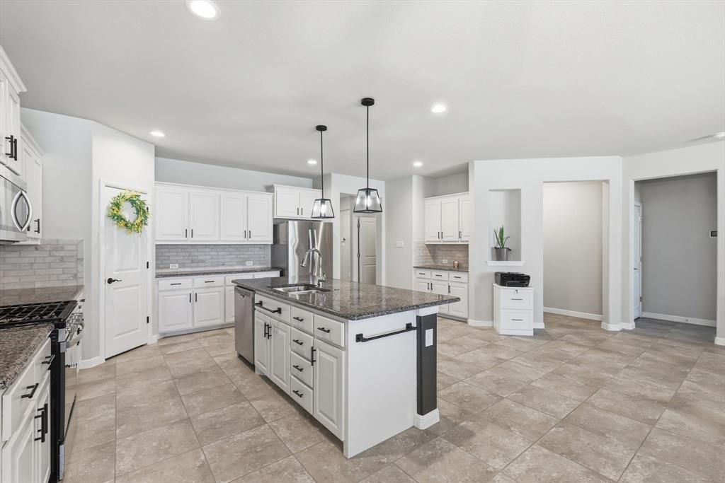 8809 Thompson Road Northlake, TX 76226 - Photo 1 of 35 8809 Thompson Road boasts a stylish kitchen.