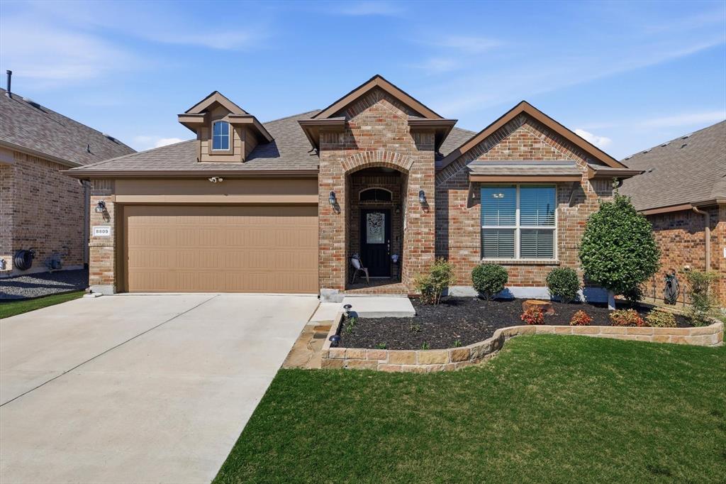 8809 Thompson Road Northlake, TX 76226 - Photo 2 of 35 8809 Thompson Road is an inviting home nestled in the Harvest Meadows community of Northlake.