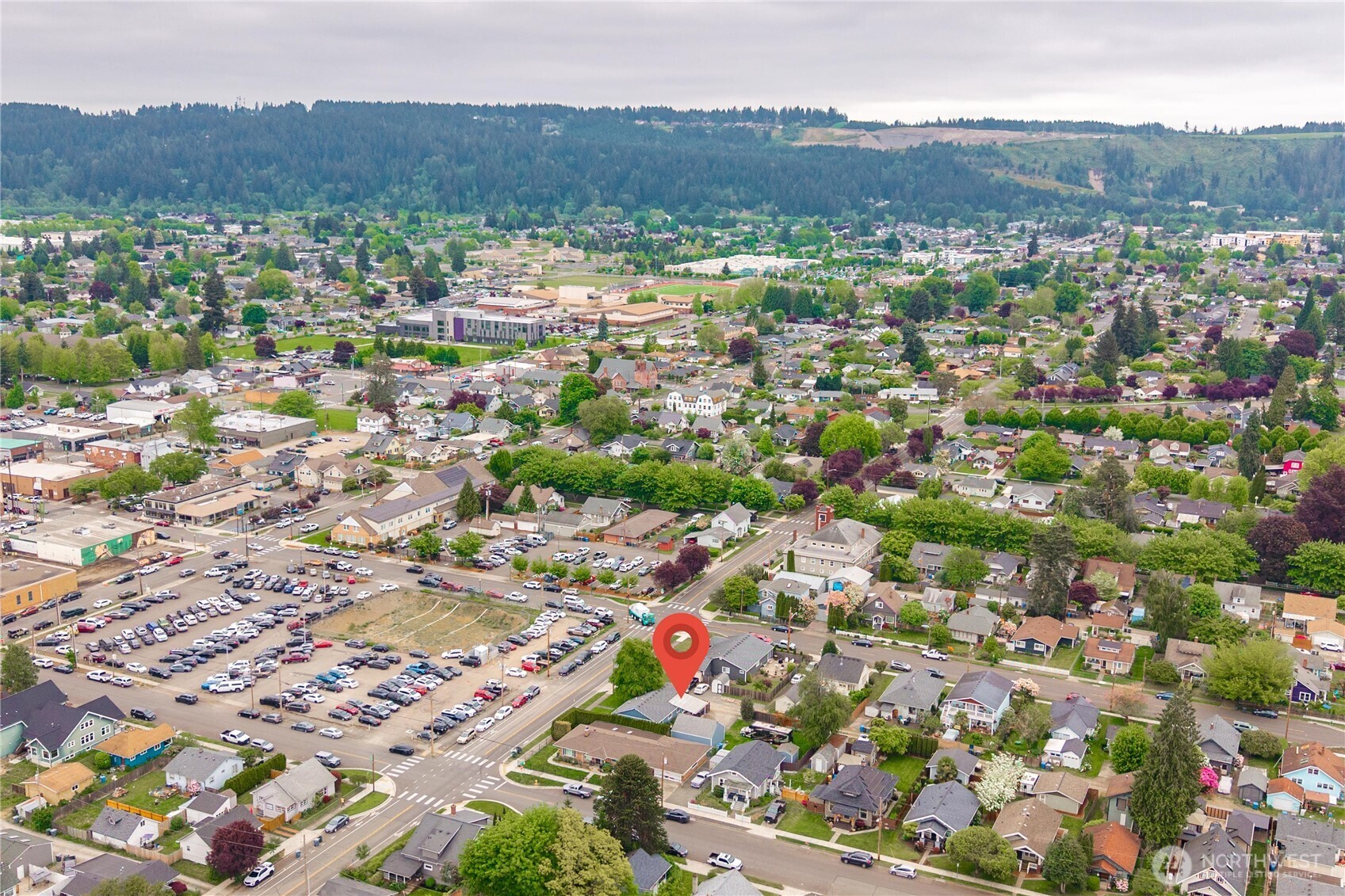 1010 Academy Street Sumner, WA 98390 - Photo 37 of 37 an aerial view of residential houses with outdoor space