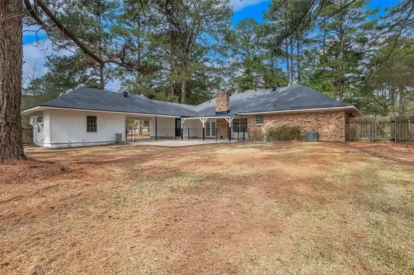 a house with yard in front of it