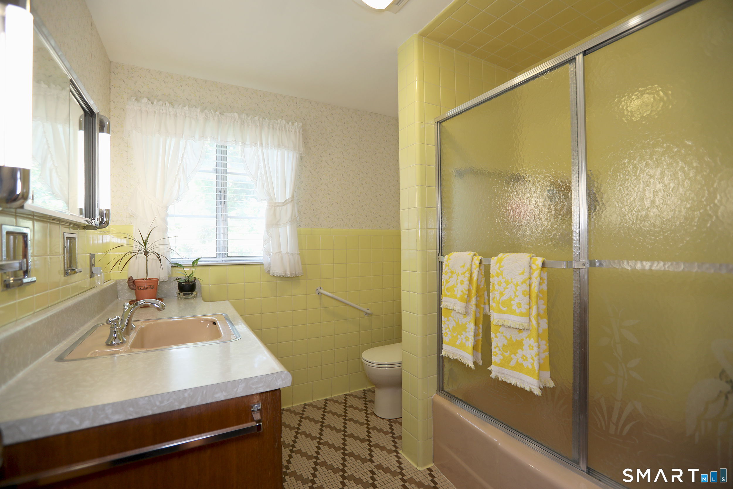 9 Westbrook Road Bloomfield, CT 06002 - Photo 13 of 20 The full bath is located at the end of the hall, right near the largest bedroom.
