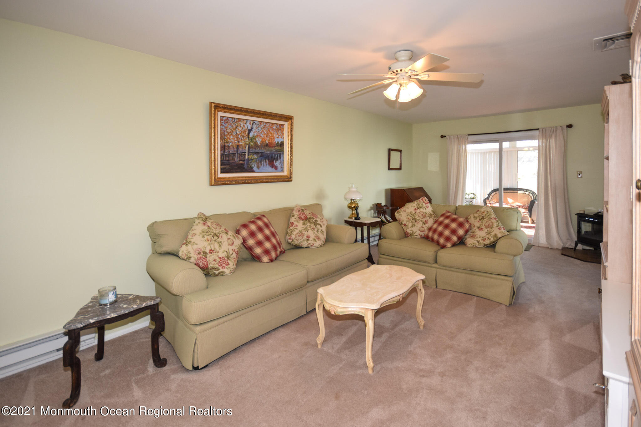 146 Clay Circle Brick, NJ 08724 - Photo 4 of 20 a living room with furniture and a chandelier