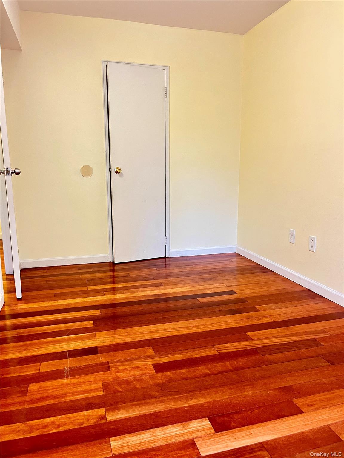 142-15 Franklin Avenue, Unit 3F Queens, NY 11355 - Photo 9 of 15 Unfurnished room featuring light wood-type flooring