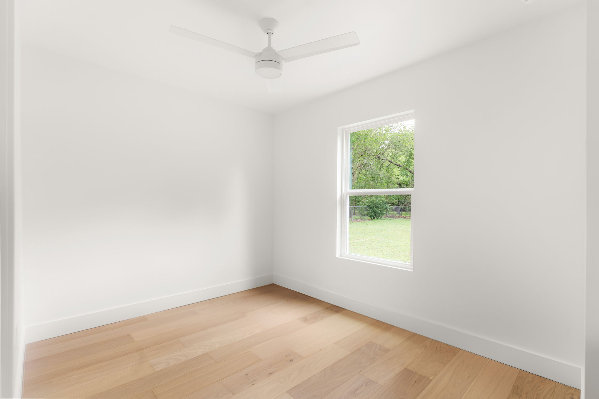4902 Blueberry Trail, Unit 1 Austin, TX 78723 - Photo 26 of 30 an empty room with a window
