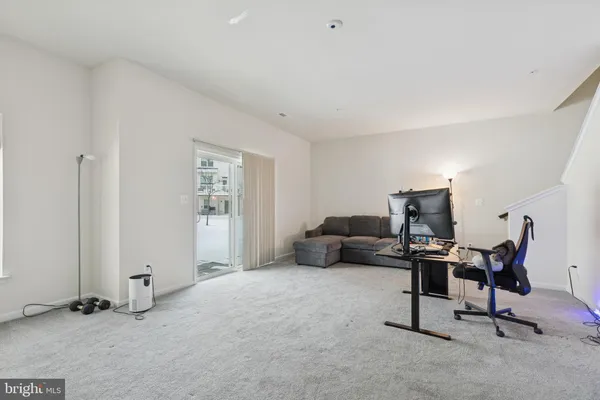 a view of a livingroom with a workspace