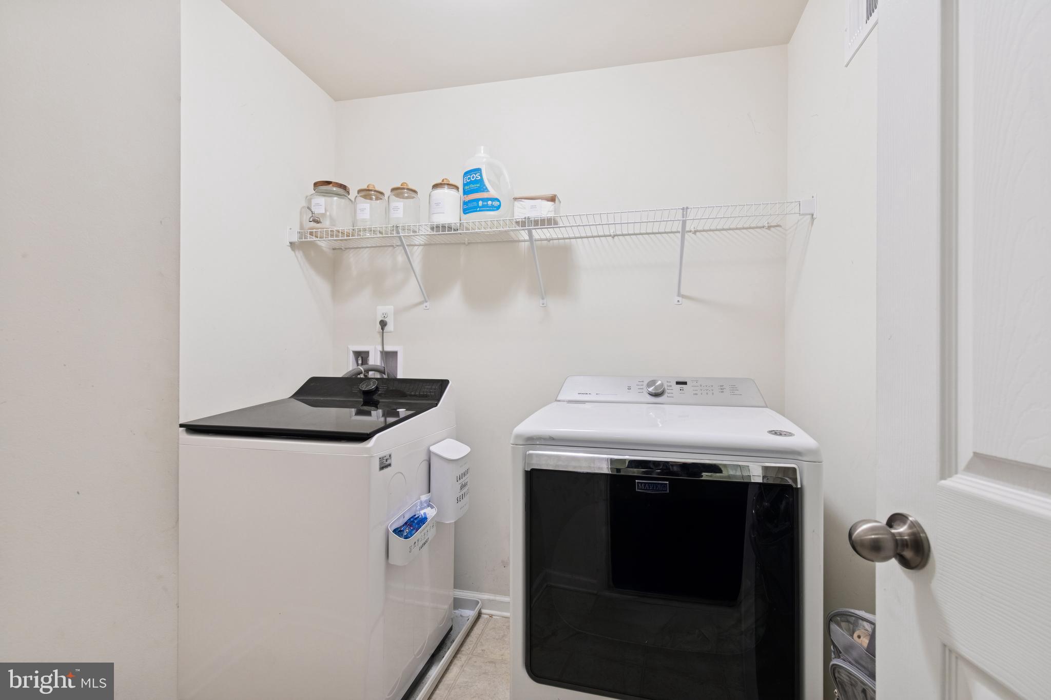 5857 Bella Marie Way, Unit F Frederick, MD 21703 - Photo 24 of 45 a utility room with dryer and washer