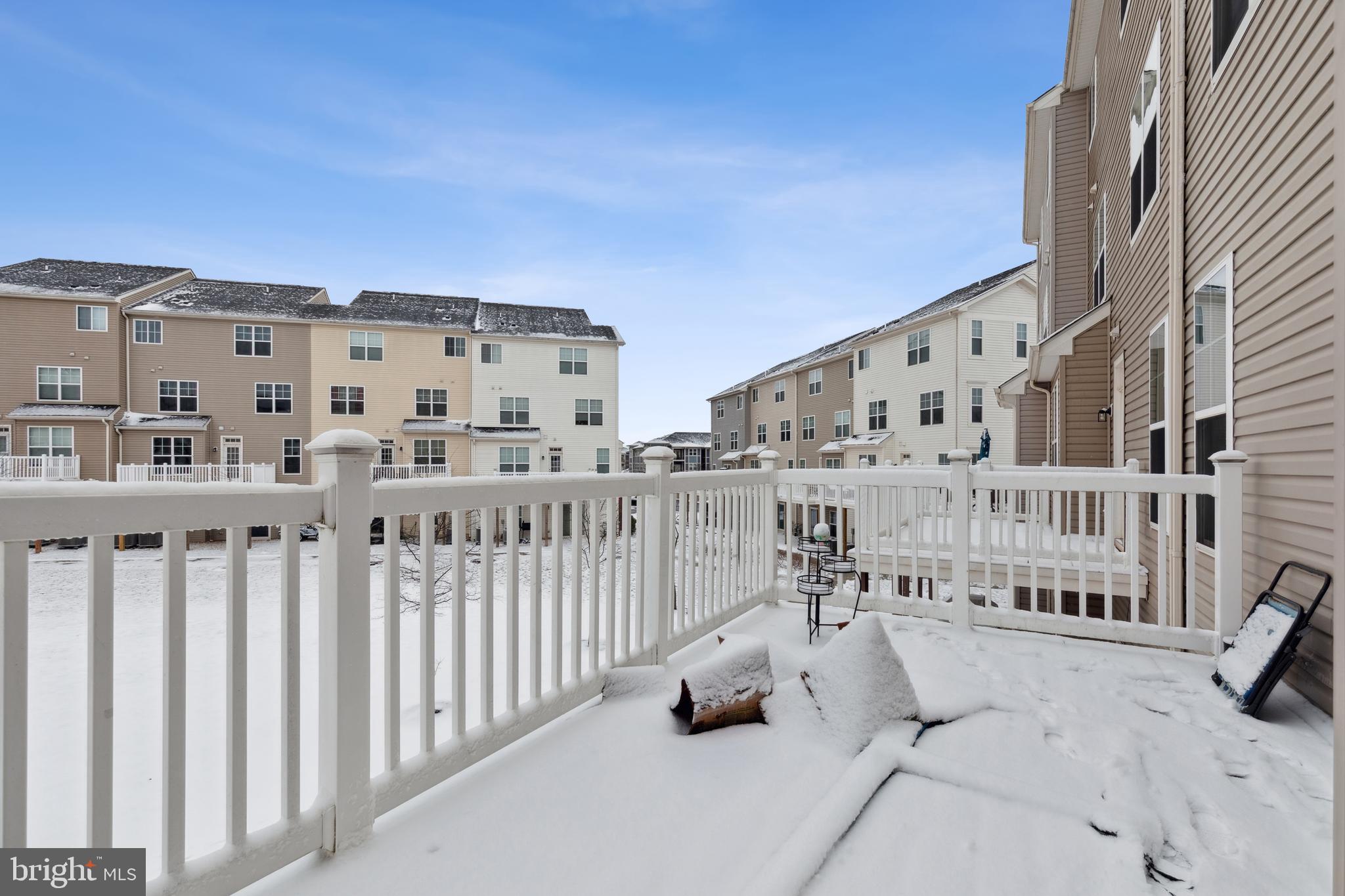 5857 Bella Marie Way, Unit F Frederick, MD 21703 - Photo 39 of 45 a view of building with terrace
