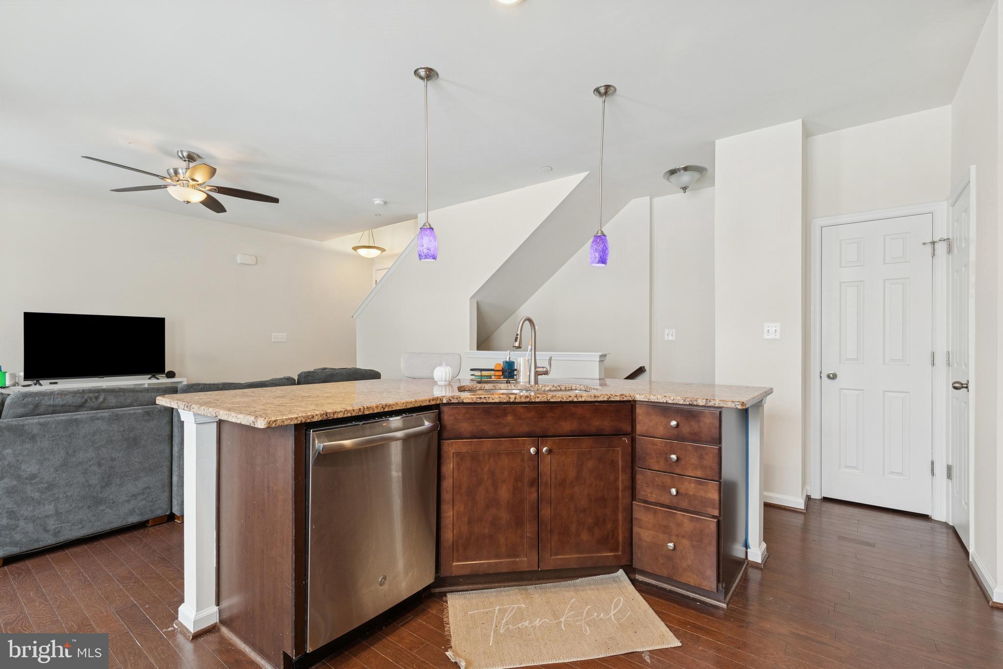 5857 Bella Marie Way, Unit F Frederick, MD 21703 - Photo 9 of 45 a view of kitchen with a sink and a stove