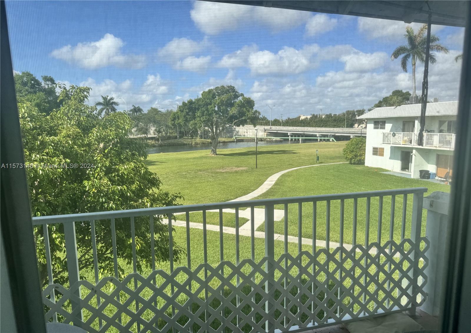 7580 Southwest 82nd Street, Unit F217 Miami, FL 33143 - Photo 11 of 14 a view of a balcony
