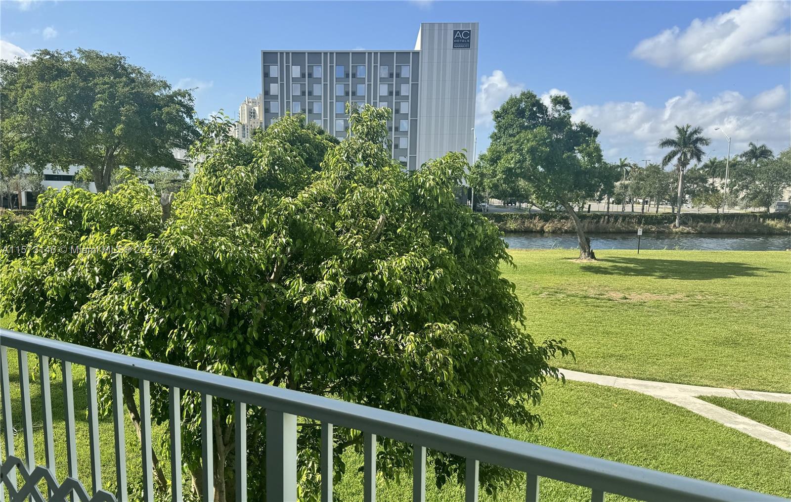 7580 Southwest 82nd Street, Unit F217 Miami, FL 33143 - Photo 10 of 14 a view of lake from balcony