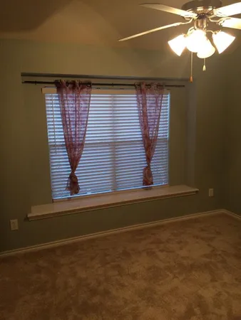 a view of empty room with window