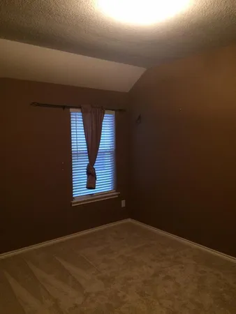 a view of empty room with window