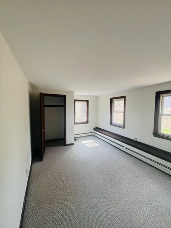 an empty room with windows