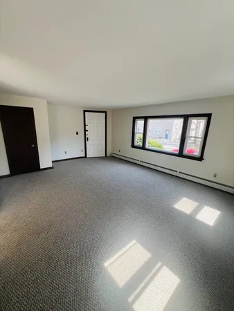a view of a livingroom with a staircase