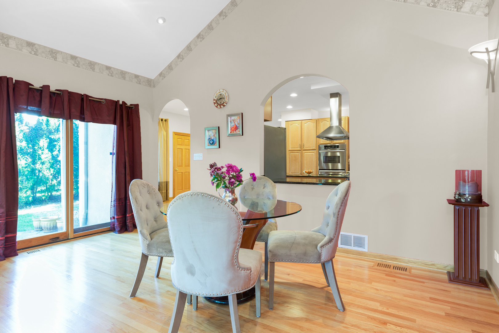 1050 Ridge Road Highland Park, IL 60035 - Photo 13 of 33 a view of a dining room with furniture and wooden floor