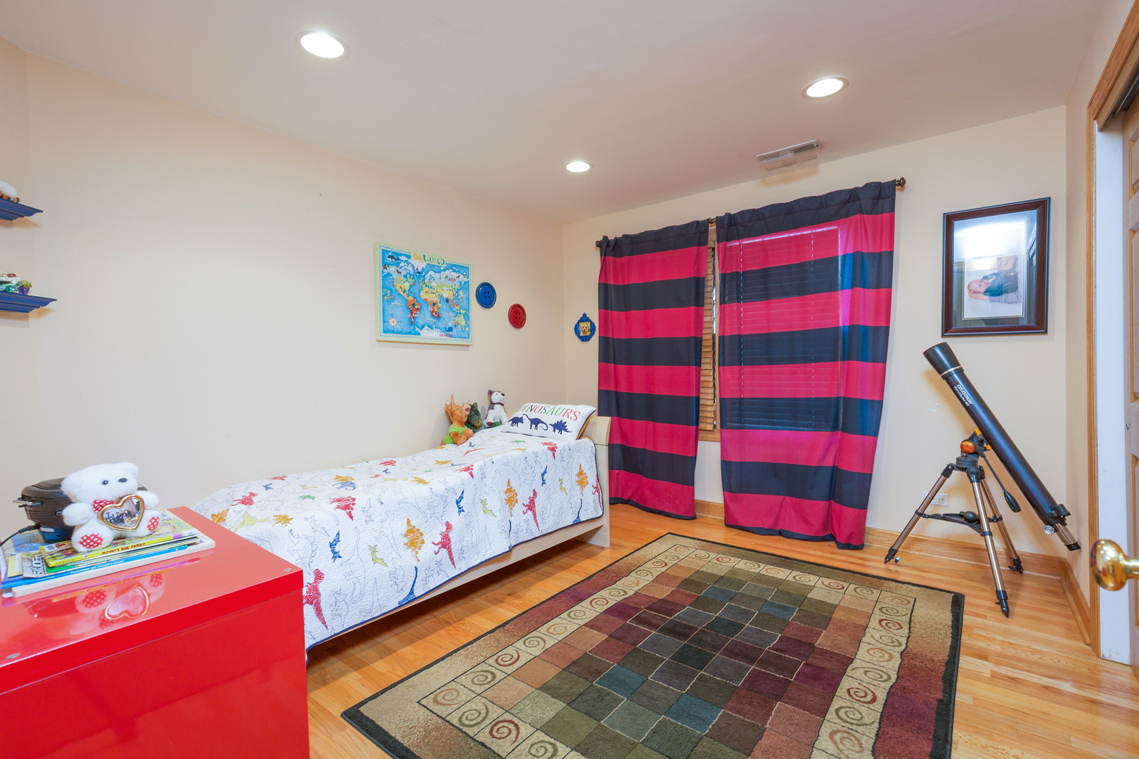 1050 Ridge Road Highland Park, IL 60035 - Photo 23 of 33 a bedroom with a bed and wooden floor