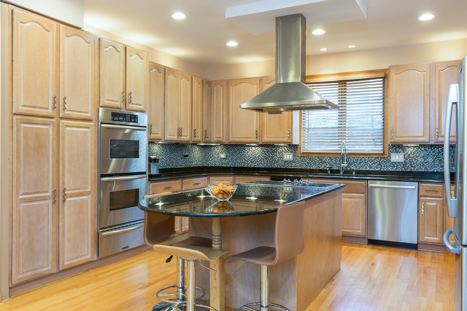 1050 Ridge Road Highland Park, IL 60035 - Photo 5 of 33 a kitchen with stainless steel appliances granite countertop a stove a sink and a refrigerator