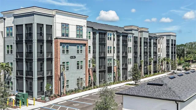 a view of a park with a apartment